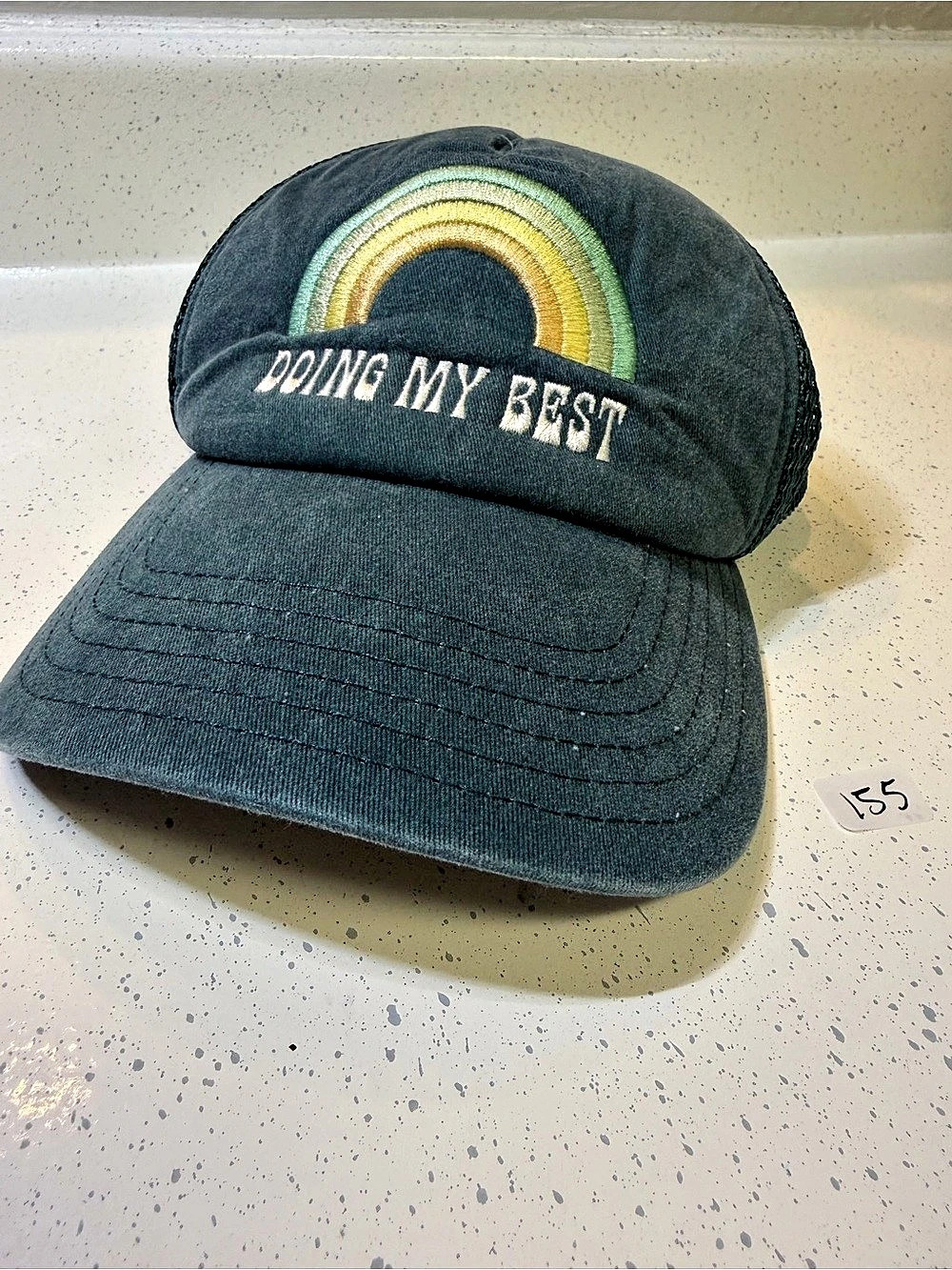 Mighty Fine Doing My Best Rainbow Trucker Hat Blue & Green